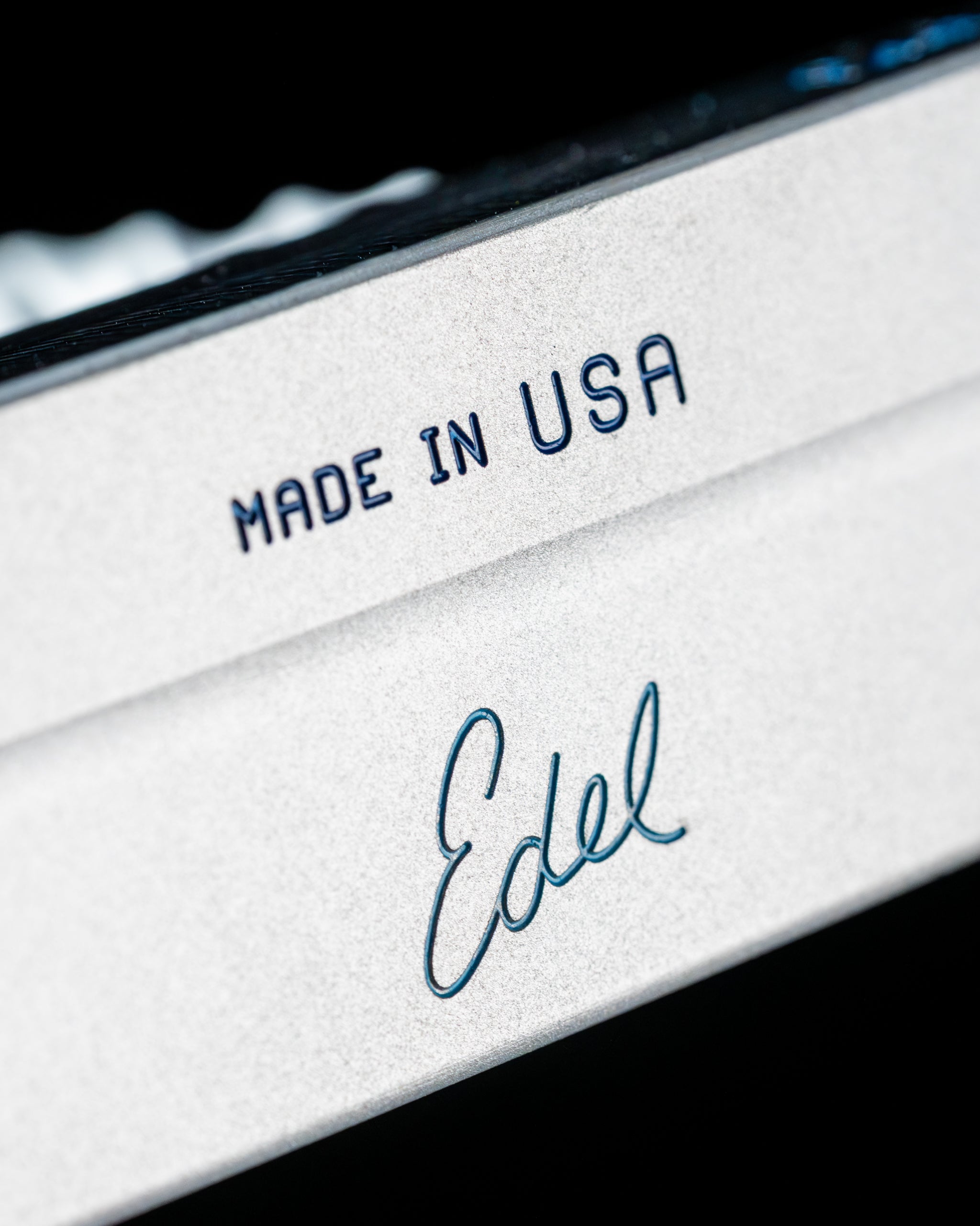 Close-up of the Edel Twister Putter showcasing its sleek design and "Made in USA" engraving, emphasizing quality craftsmanship.