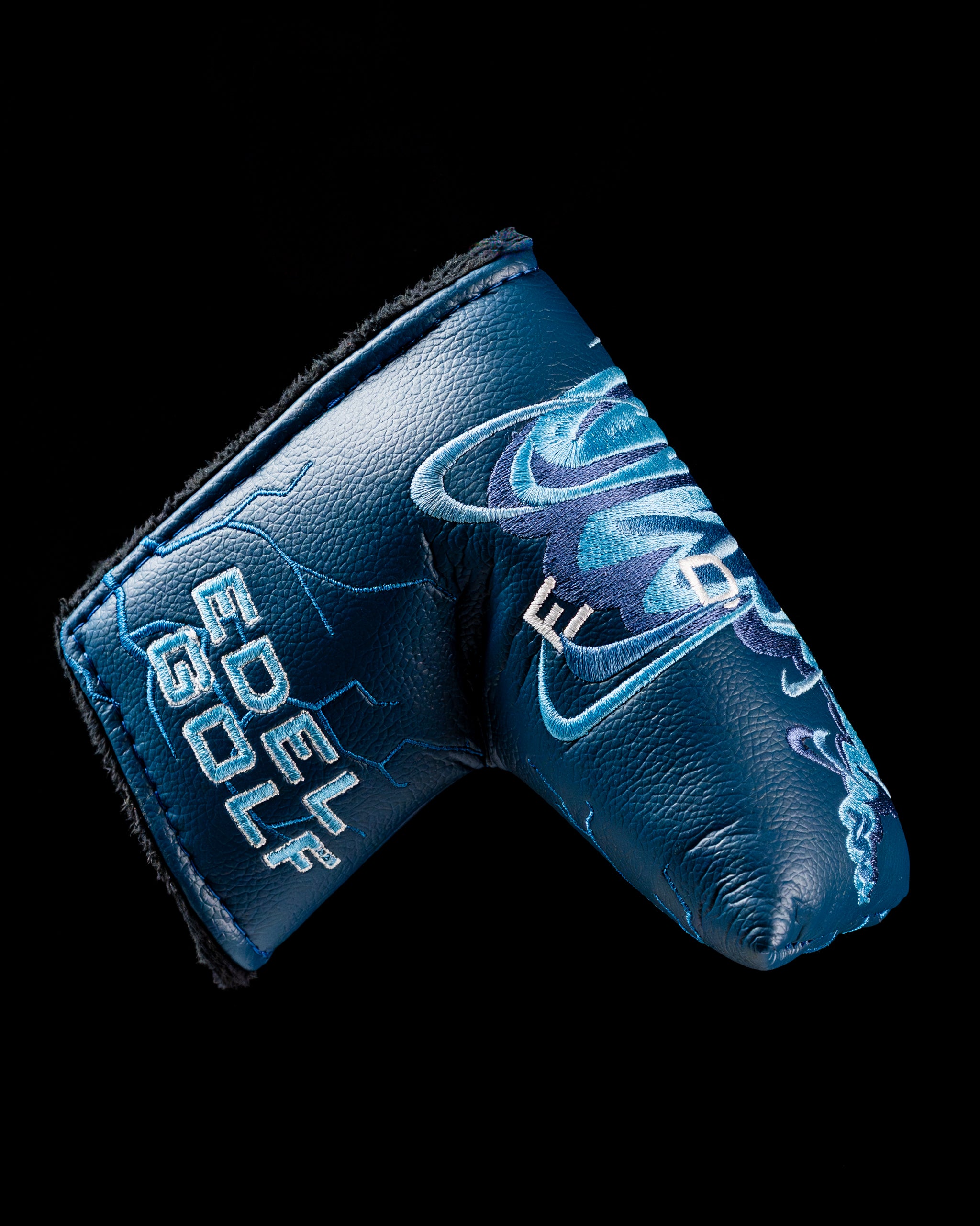 Edel Twister Putter headcover featuring a sleek blue design with intricate patterns, ideal for stylish golfers.