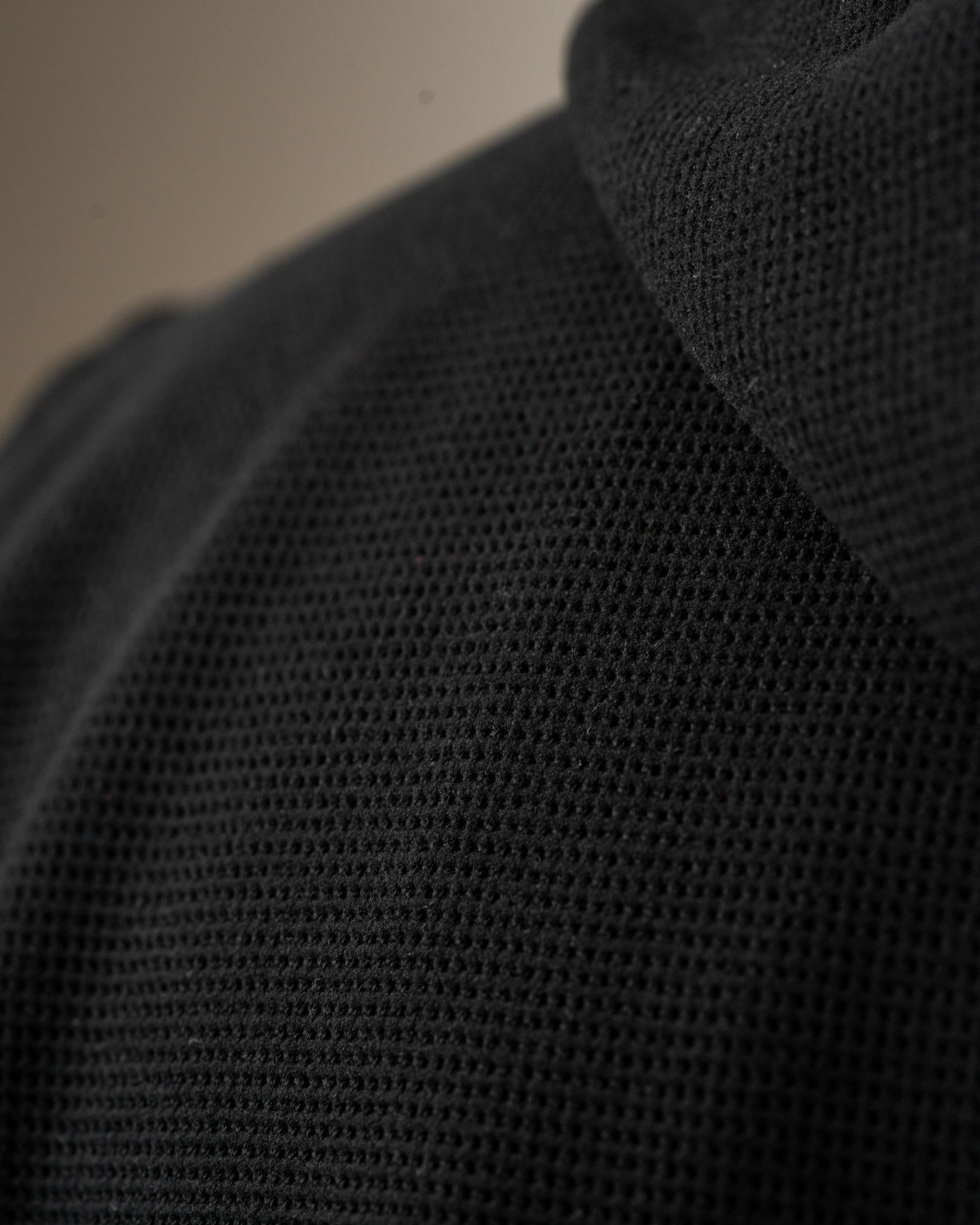 Close-up of the Player Preferred Waffle Grid Hoodie in Obsidian, showcasing its textured fabric and stylish design.